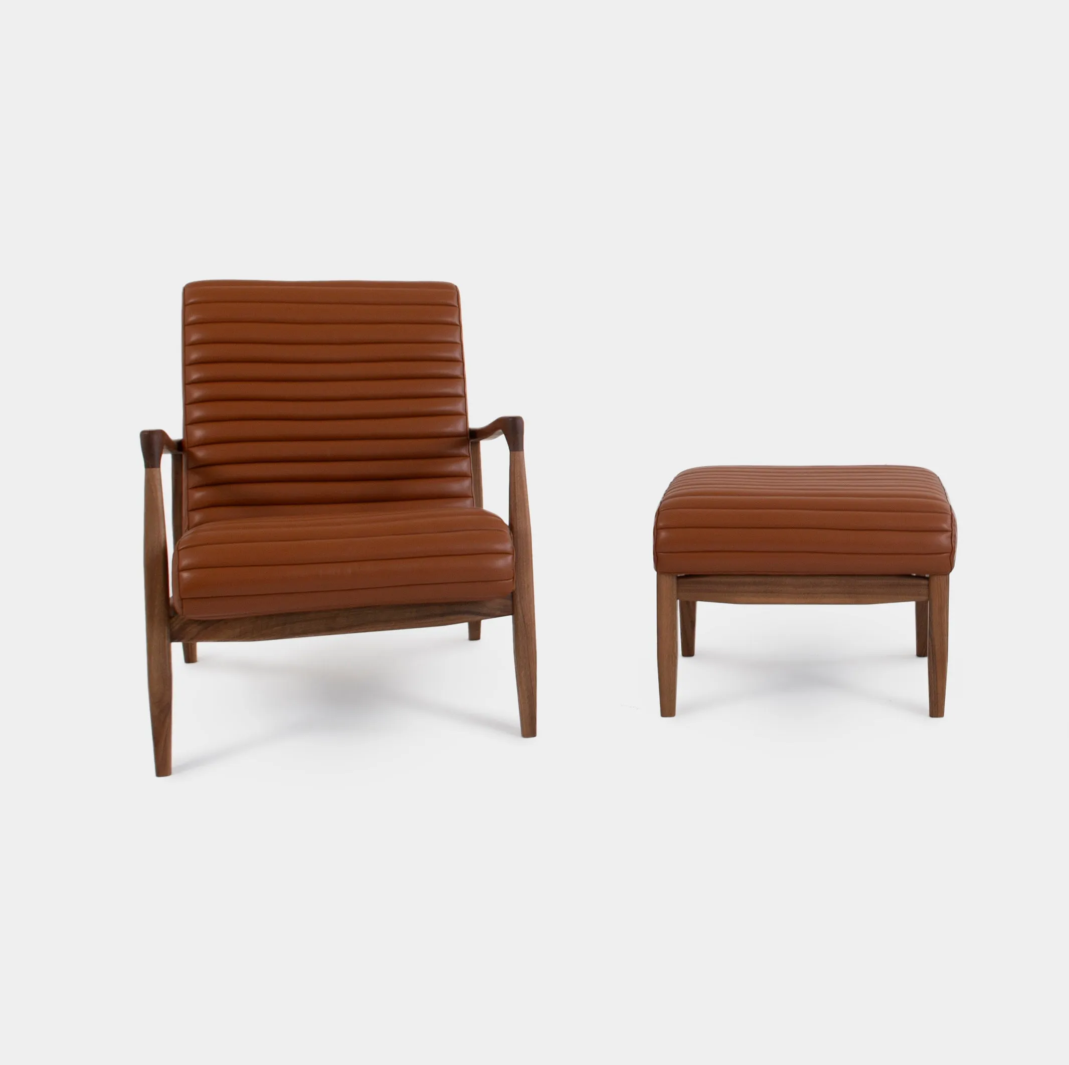 LAICA | Modern Armchair and Ottoman in Spanish Leather or Wool