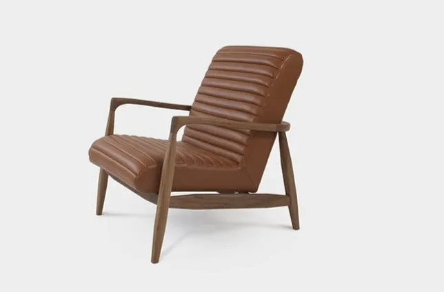 LAICA | Modern Armchair and Ottoman in Spanish Leather or Wool