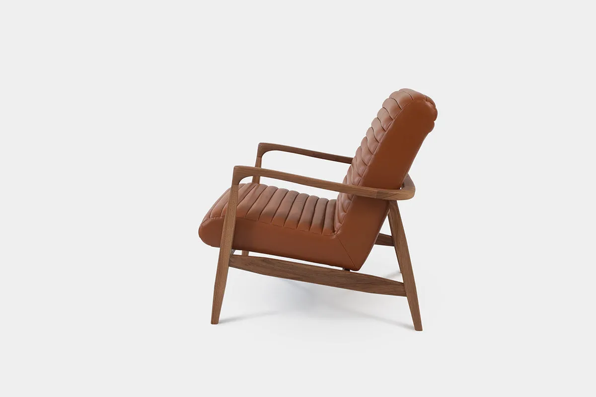 LAICA | Modern Armchair and Ottoman in Spanish Leather or Wool